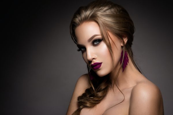 Make up. Glamour portrait of beautiful woman model with fresh makeup and romantic hairstyle.