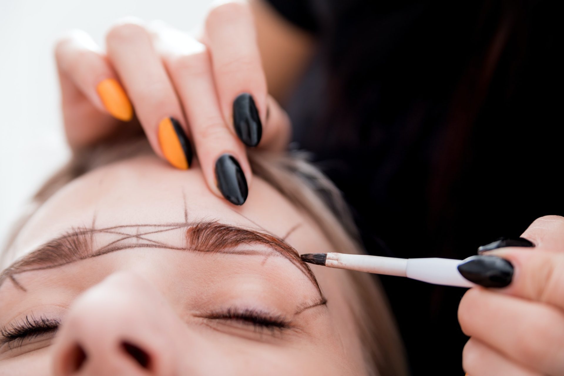 Permanent make up on eyebrows at beauty salon